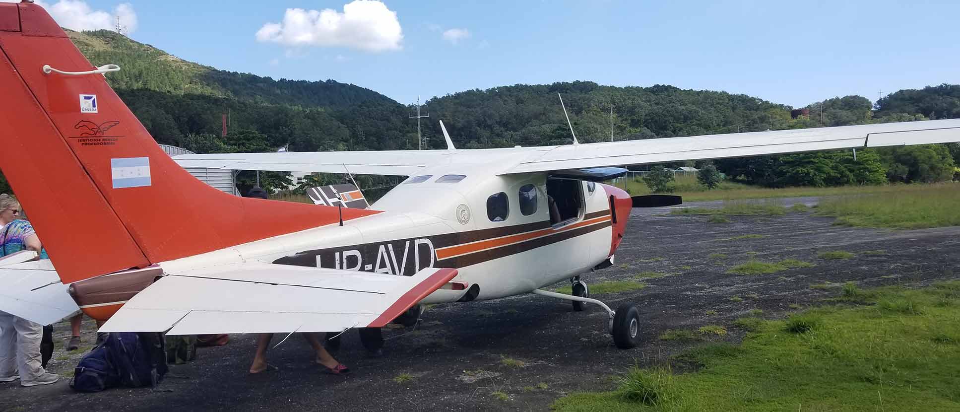 charter plane to Guanaja